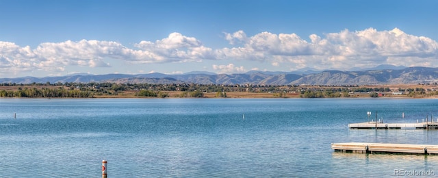 7100 Stuart St, Westminster, CO 80030 - water view featuring a floating dock and a mountainous background