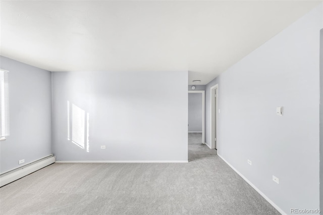 7100 Stuart St, Westminster, CO 80030 - carpeted spare room with a baseboard radiator and plenty of natural light