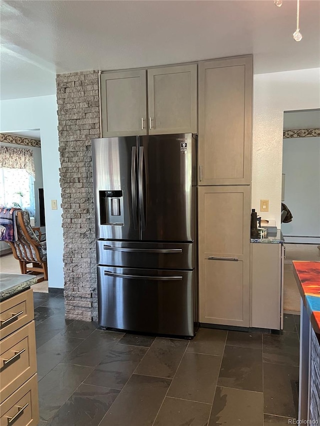 4307 Valli Vista Rd, Colorado Springs, CO 80915 - kitchen featuring stainless steel fridge with ice dispenser and gray cabinets