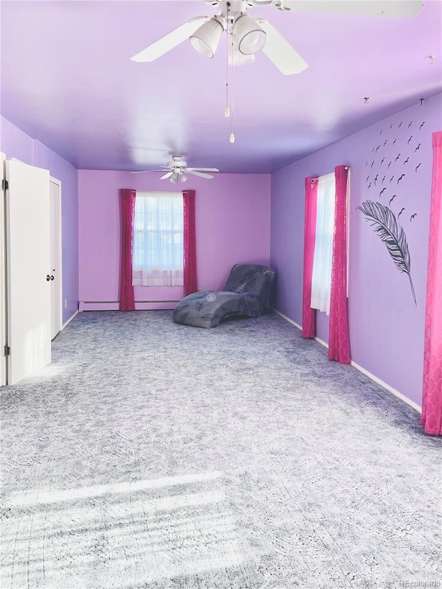 4307 Valli Vista Rd, Colorado Springs, CO 80915 - unfurnished room with carpet flooring, a ceiling fan, and a baseboard heating unit