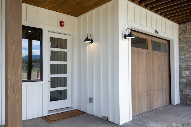 166 Hay Meadow Dr, Fraser, CO 80442 - doorway to property featuring board and batten siding