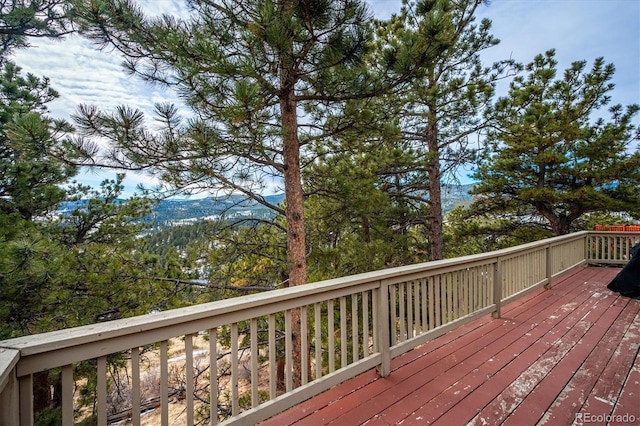 wooden terrace with a mountain view