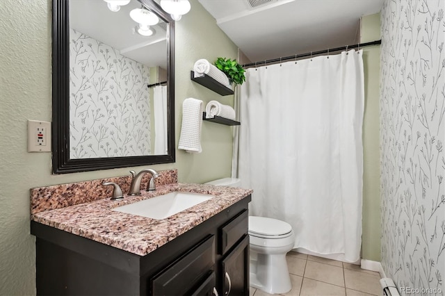 bathroom featuring tile patterned floors, toilet, curtained shower, and vanity