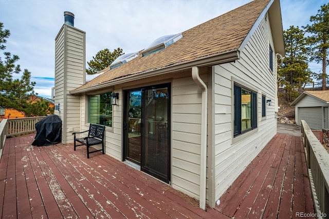 wooden deck featuring grilling area