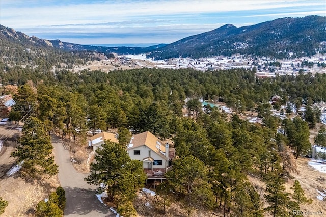 drone / aerial view featuring a mountain view