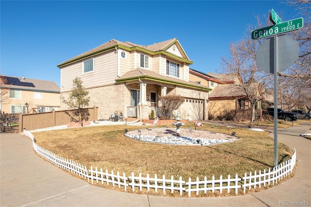 view of front facade featuring a front yard