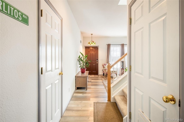 hall featuring light wood-type flooring