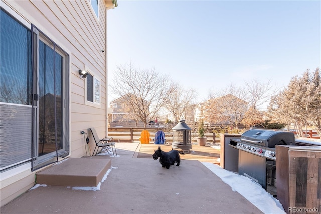 view of patio with an outdoor kitchen and area for grilling