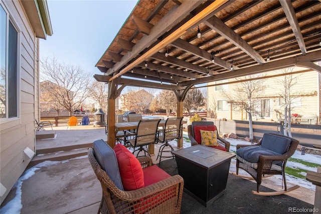 view of patio / terrace featuring a fire pit