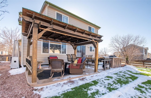 view of snow covered patio