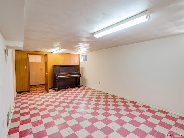 finished basement with visible vents and light floors