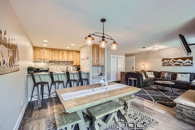 815 Columbine Rd Unit 22, Breckenridge, CO 80424 - dining room featuring wood finished floors and recessed lighting