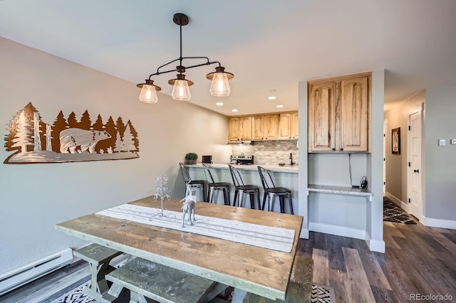 815 Columbine Rd Unit 22, Breckenridge, CO 80424 - dining space with baseboard heating, dark wood finished floors, and recessed lighting