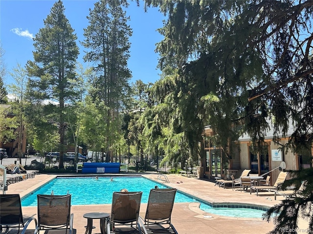 815 Columbine Rd Unit 22, Breckenridge, CO 80424 - community pool with a patio area and view of scattered trees