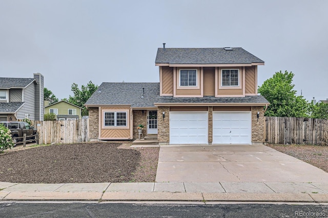 3455 Sun River Pl, Colorado Springs, CO 80920 - traditional-style home featuring a garage, driveway, a shingled roof, and stone siding