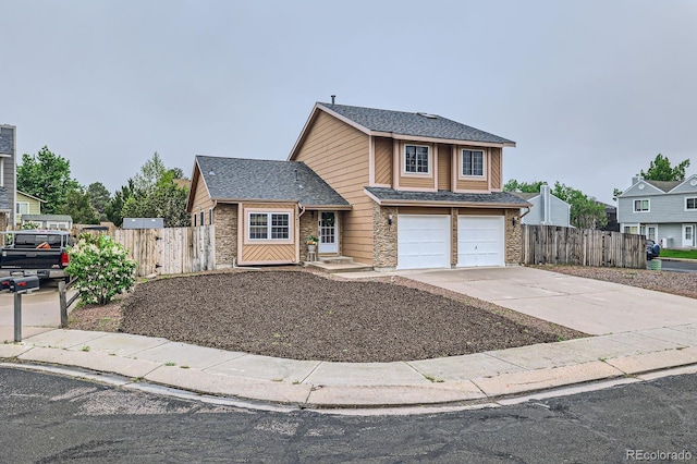 3455 Sun River Pl, Colorado Springs, CO 80920 - traditional-style house featuring driveway, an attached garage, stone siding, and a shingled roof