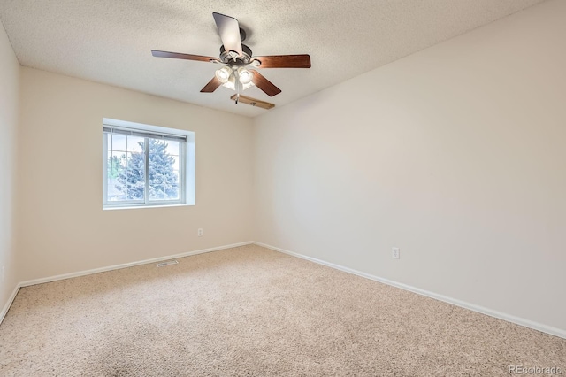 3455 Sun River Pl, Colorado Springs, CO 80920 - carpeted empty room featuring baseboards, ceiling fan, and a textured ceiling