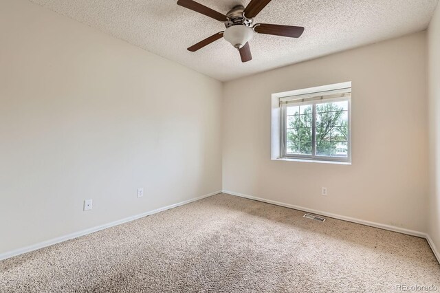 3455 Sun River Pl, Colorado Springs, CO 80920 - carpeted spare room featuring a textured ceiling, baseboards, and ceiling fan