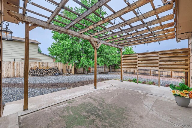 3455 Sun River Pl, Colorado Springs, CO 80920 - fenced backyard featuring a patio area and a pergola