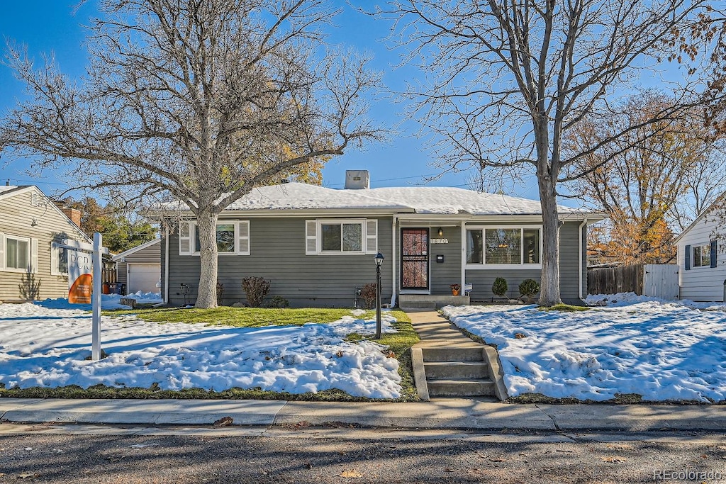 single story home with a garage