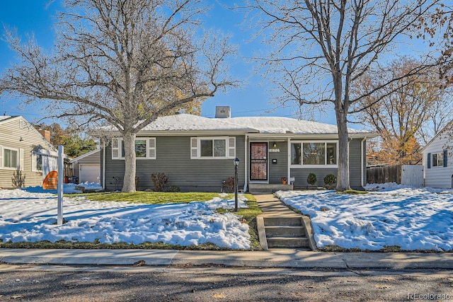 single story home with a garage