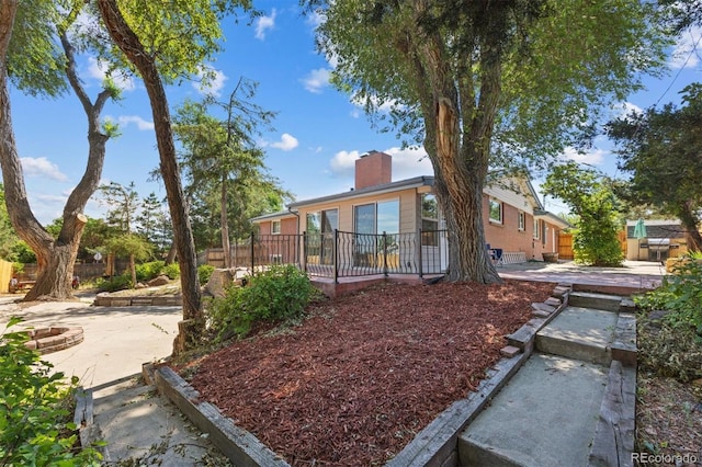 view of front of home featuring a patio