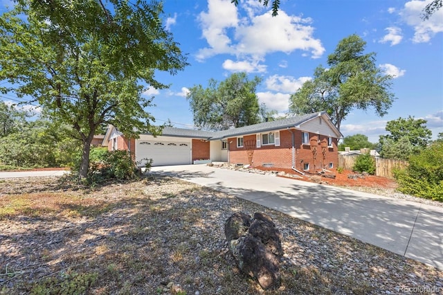 single story home with a garage