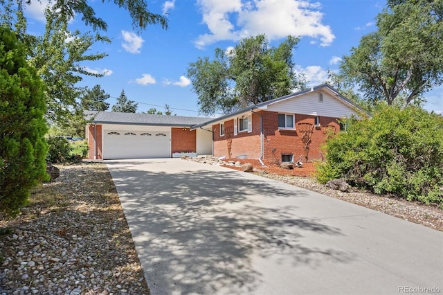 single story home with a garage