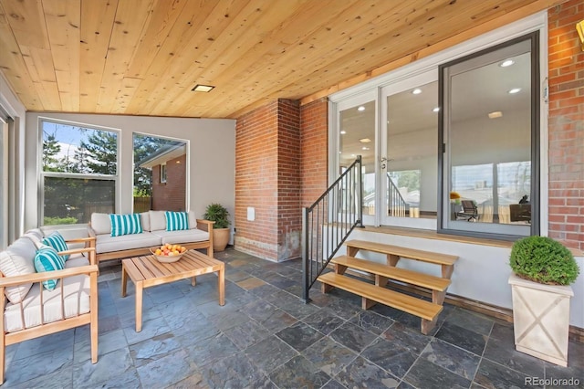 sunroom / solarium with vaulted ceiling and wooden ceiling