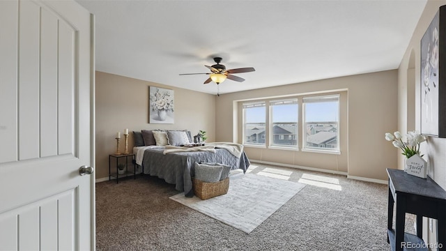 8308 Needle Drop Ct, Colorado Springs, CO 80908 - carpeted bedroom featuring baseboards and a ceiling fan