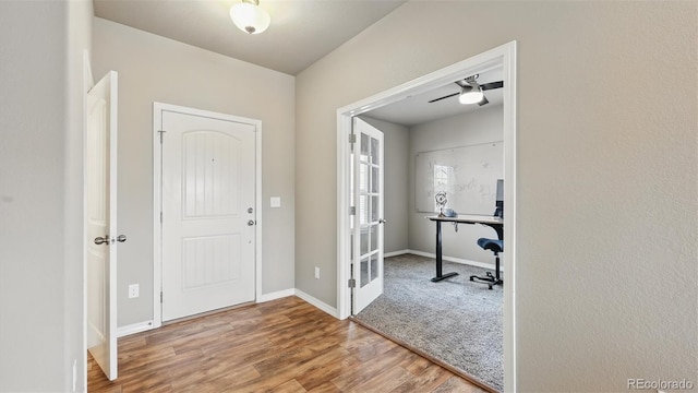8308 Needle Drop Ct, Colorado Springs, CO 80908 - entrance foyer featuring wood finished floors and baseboards