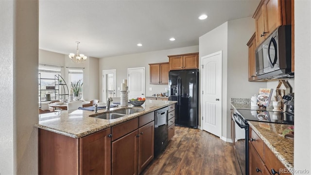8308 Needle Drop Ct, Colorado Springs, CO 80908 - kitchen featuring black fridge with ice dispenser, stainless steel microwave, range with electric stovetop, dishwashing machine, and dark wood-style flooring