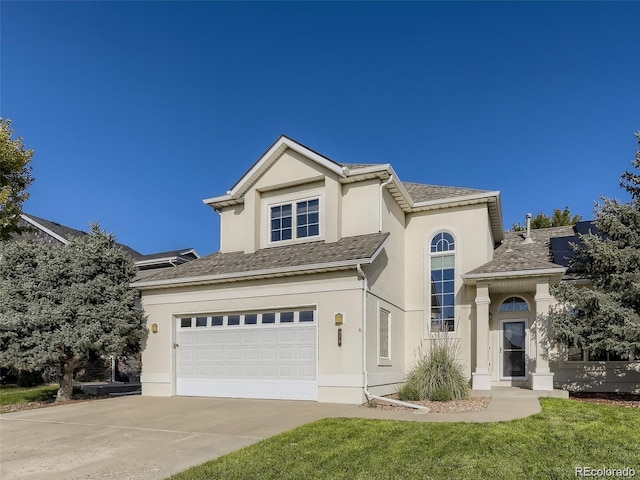 view of front of home with a garage