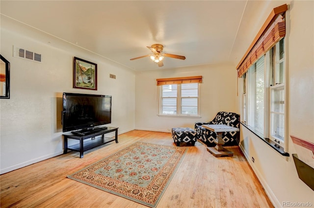 4130 S Elati St, Englewood, CO 80110 - sitting room with wood finished floors and ceiling fan