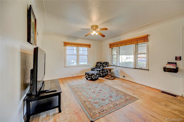 4130 S Elati St, Englewood, CO 80110 - living area with a ceiling fan and wood finished floors