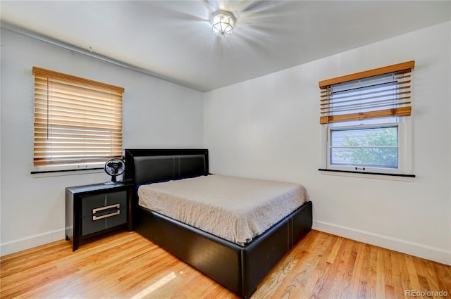 4130 S Elati St, Englewood, CO 80110 - bedroom with baseboards and light wood-type flooring