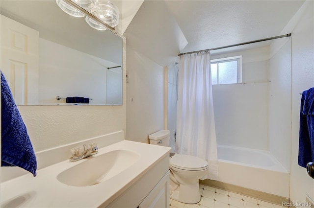 4130 S Elati St, Englewood, CO 80110 - full bathroom featuring vanity, shower / bath combo with shower curtain, and tile patterned floors