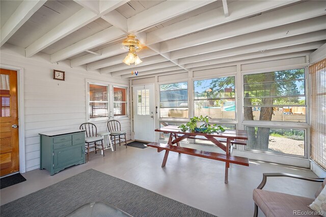 2028 Downing Dr, Colorado Springs, CO 80909 - sunroom / solarium with concrete floors and beamed ceiling