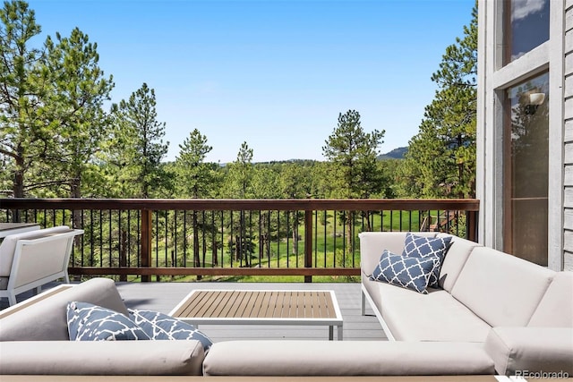 2122 Cramner Ct, Evergreen, CO 80439 - wooden terrace with outdoor lounge area