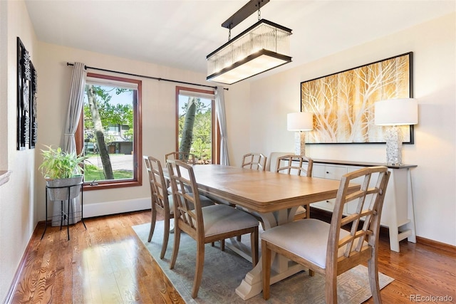 2122 Cramner Ct, Evergreen, CO 80439 - dining area with wood finished floors and baseboards
