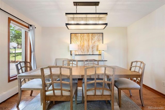 2122 Cramner Ct, Evergreen, CO 80439 - dining area with baseboards and wood finished floors