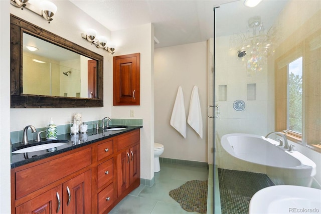 2122 Cramner Ct, Evergreen, CO 80439 - full bathroom with a tub to relax in, a shower stall, toilet, and double vanity
