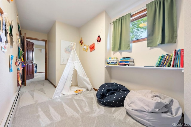 2122 Cramner Ct, Evergreen, CO 80439 - rec room featuring a baseboard heating unit and carpet