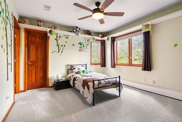 2122 Cramner Ct, Evergreen, CO 80439 - carpeted bedroom with baseboards and ceiling fan