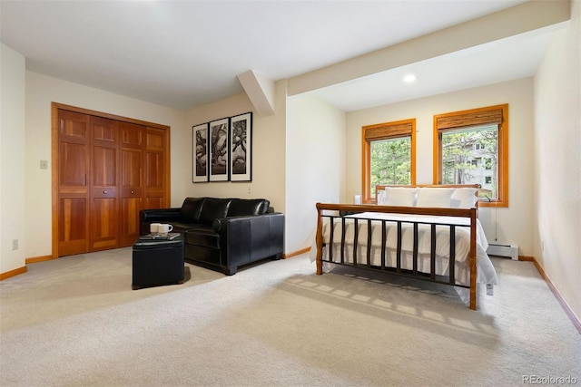 2122 Cramner Ct, Evergreen, CO 80439 - bedroom with a baseboard heating unit, carpet, baseboards, and a closet