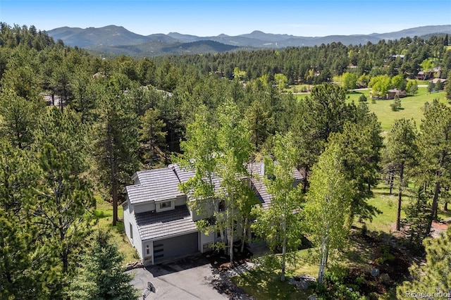 2122 Cramner Ct, Evergreen, CO 80439 - aerial view of a heavily wooded area and mountains
