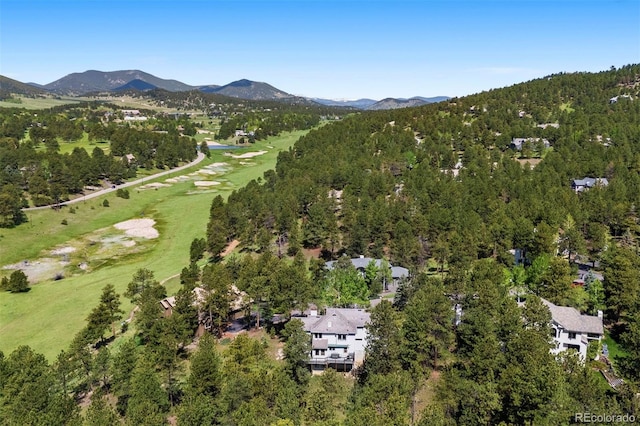 2122 Cramner Ct, Evergreen, CO 80439 - view of property location with a mountain backdrop, a local golf course, and a forest