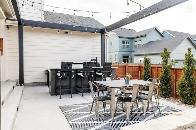 view of patio / terrace with fence and outdoor dining area