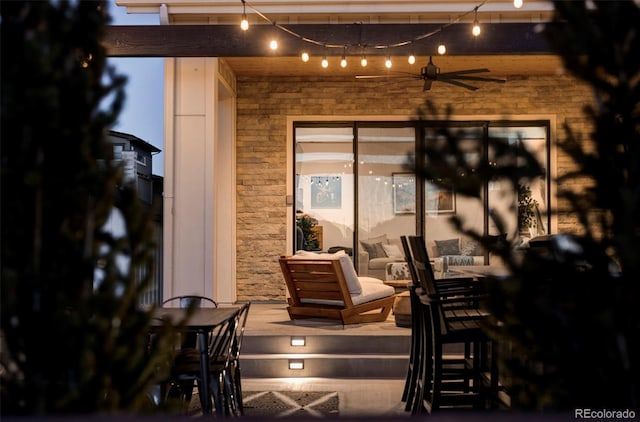 view of patio / terrace featuring ceiling fan