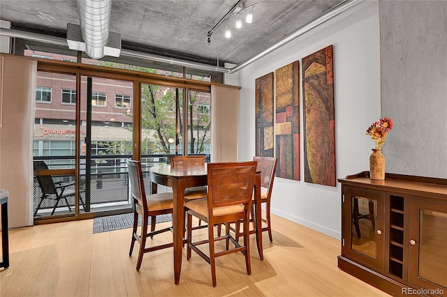 dining room with wood finished floors